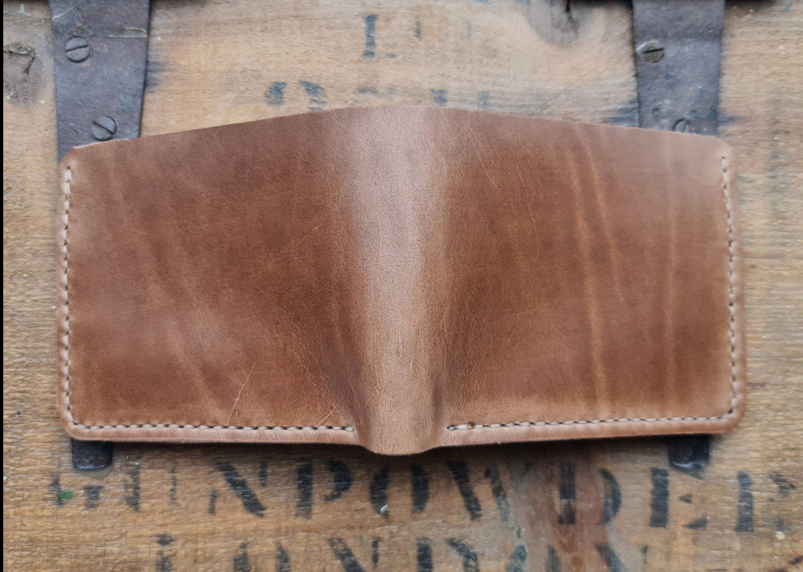 Horween Chromexcel leather on our No. 2 Frontiersman Wallet displaying natural grain patterns and colour variations