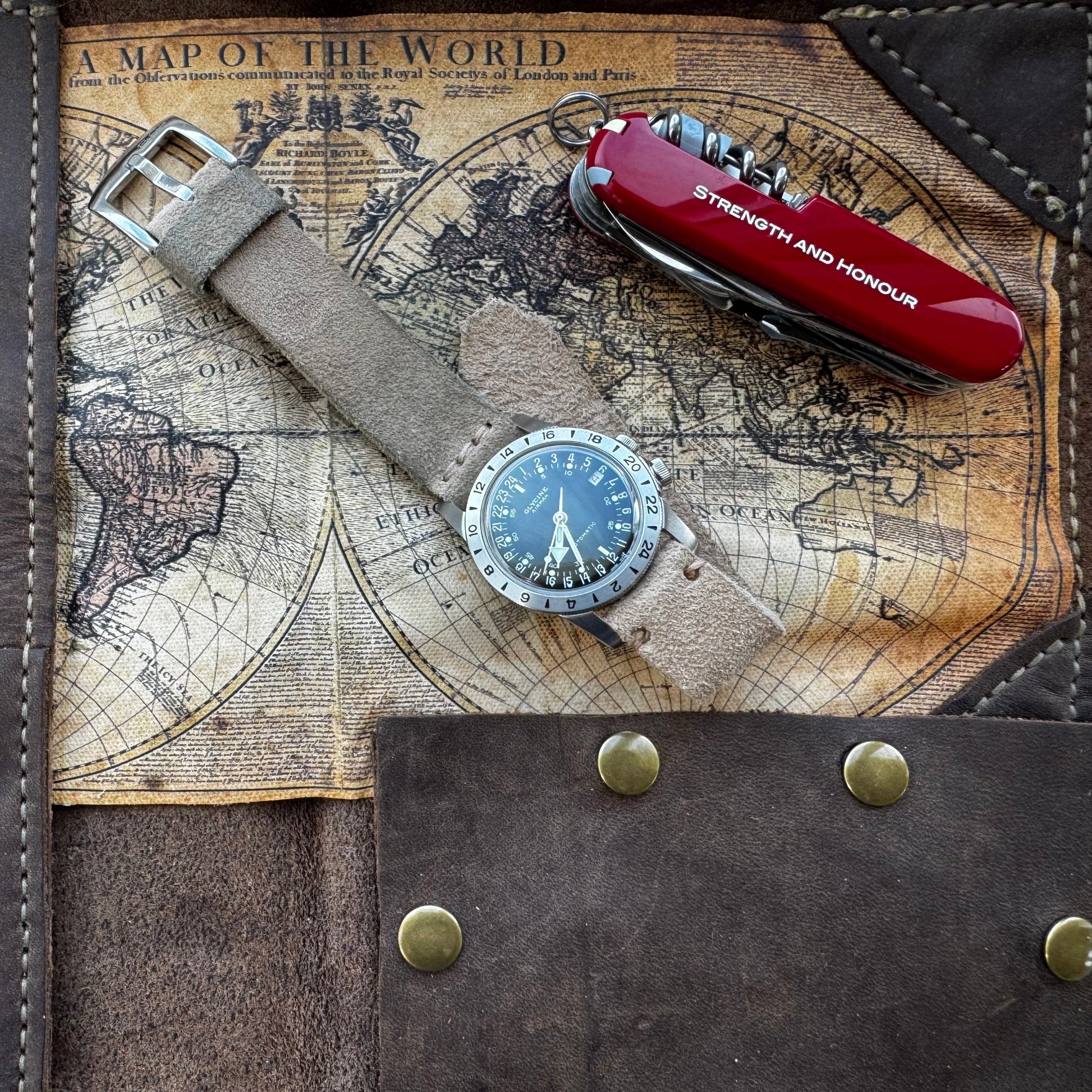 No. 1761 Coastline Leather Watch Straps - Suede, on Glycine Airman Watch , Flat on map Surface  with Swiss Army knife- Image 