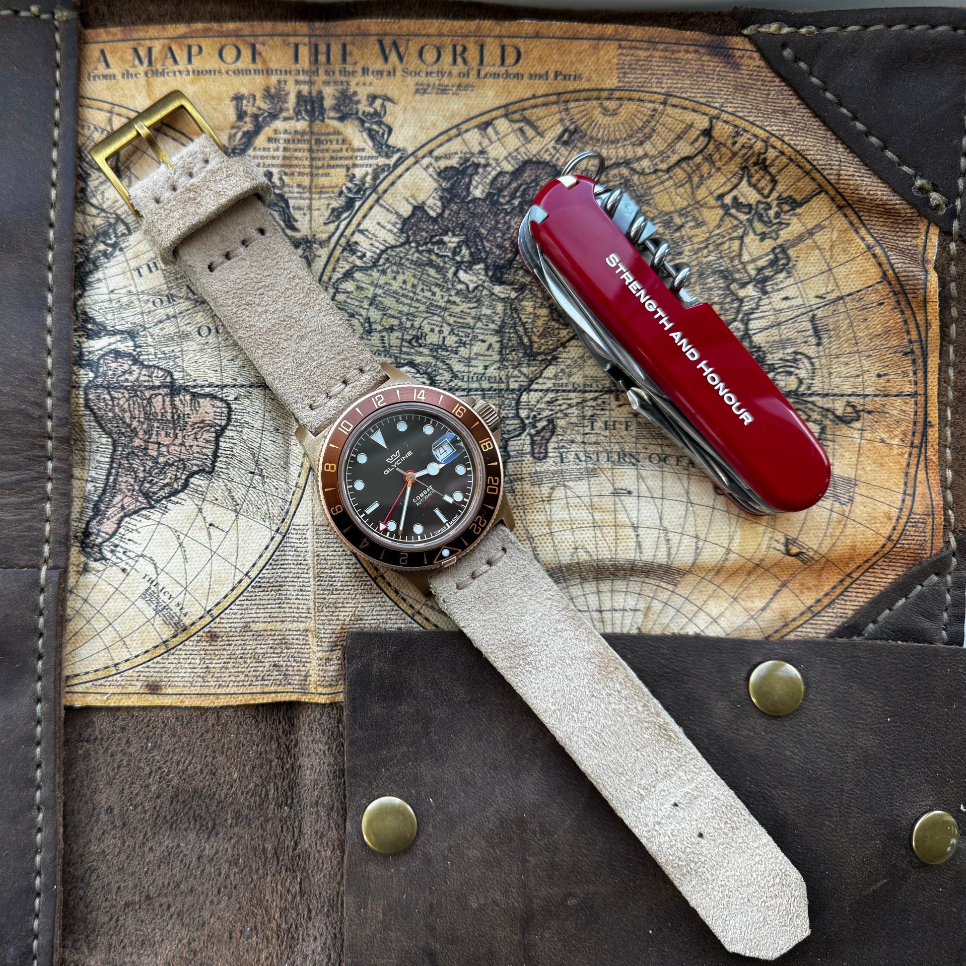 No. 1761 Coastline Leather Watch Straps - Suede, on Glycine Combat Sub , Flat on map Surface  with Swiss Army knife- Image 