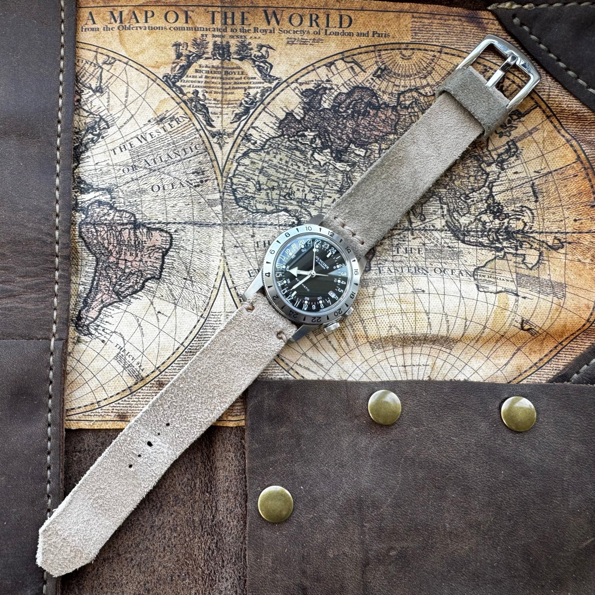 No. 53 Explorer Leather Watch Straps – Suede, on Glycine Airman Watch, Flat on Map Surface – Image