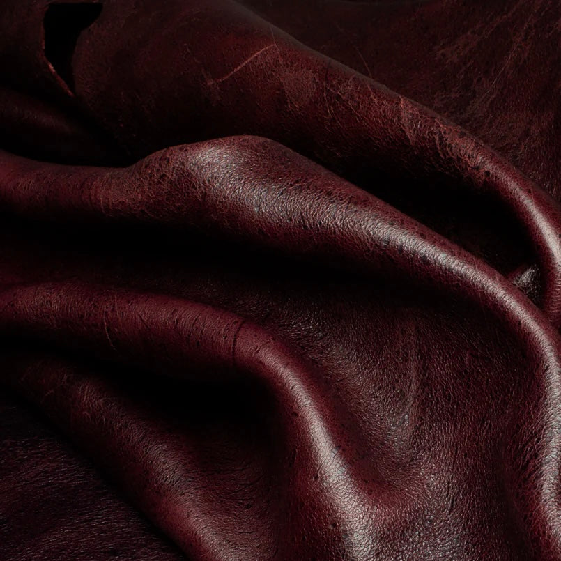 Close-up view of a premium Bull's Blood Kudu leather hide from C.F. Stead & Co, showcasing the distinct, rugged natural grain, intricate texture, and unique, character-filled finish of this exceptional exotic leather.