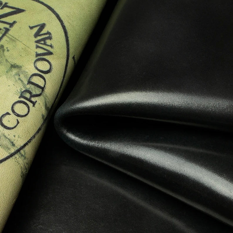 Detailed close-up shot of premium Horween Black Shell Cordovan leather, showcasing the authentic Genuine Horween Shell Cordovan maker's stamp on the reverse side.