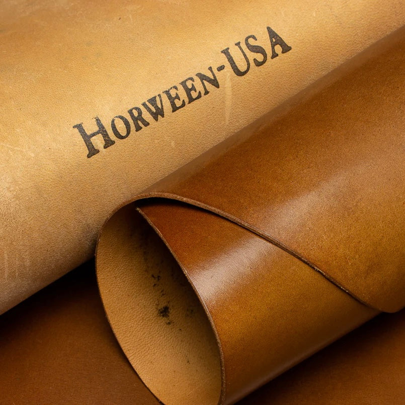 Close-up detail shot of premium Horween Bourbon Shell Cordovan leather, showcasing the authentic Horween-USA maker's stamp on the reverse side.
