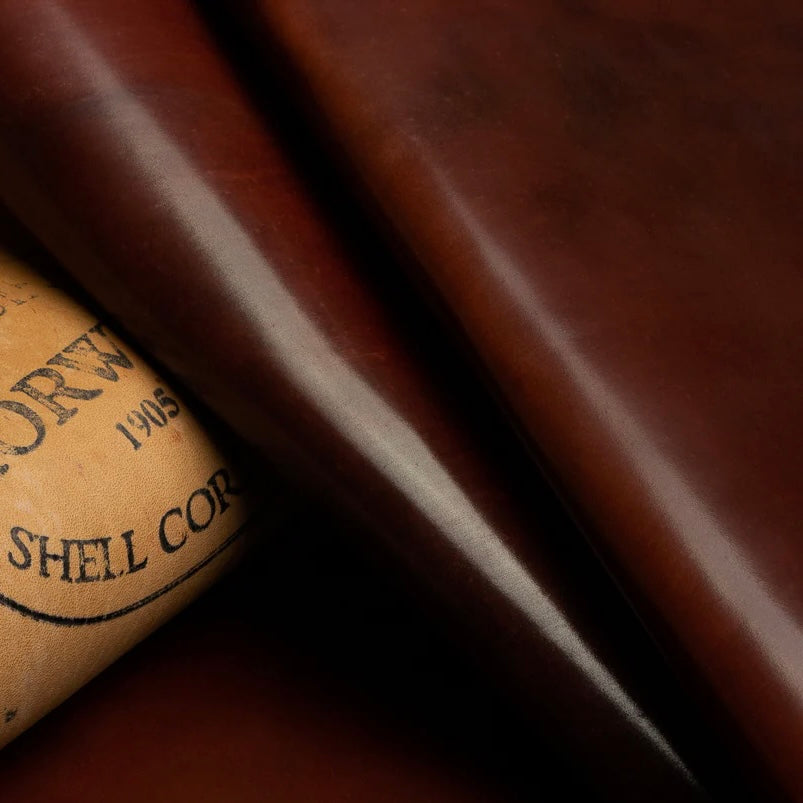 Detailed view of premium Horween Cognac Shell Cordovan leather, showcasing the authentic Genuine Horween Shell Cordovan 1905 maker's stamp on the reverse side.