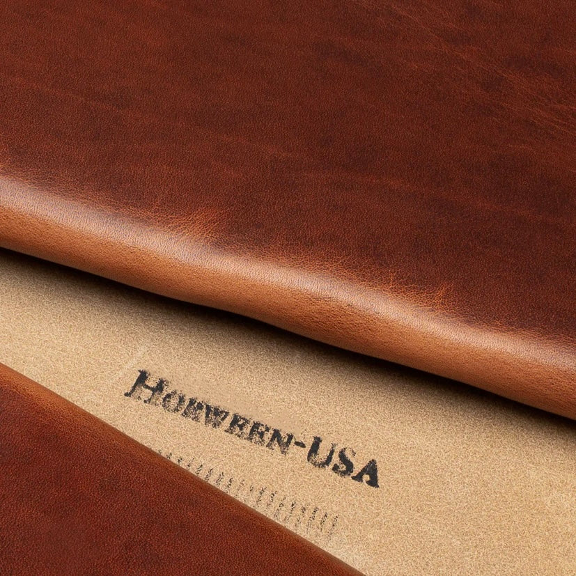 Close-up detail shot of high-quality Horween English Tan Dublin leather hide, featuring the authentic Horween USA maker's stamp on the reverse side.