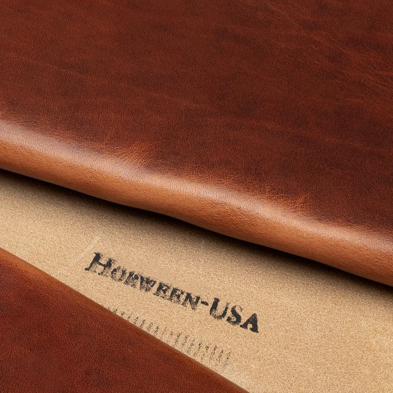 Close-up detail shot of high-quality Horween English Tan Dublin leather hide, featuring the authentic Horween USA maker's stamp on the reverse side.