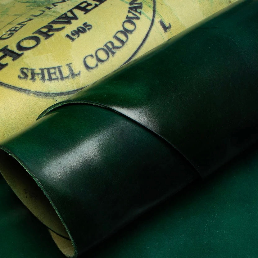 Detailed close-up shot of premium Horween Green Shell Cordovan leather, showcasing the authentic Genuine Horween Shell Cordovan 1905 maker's stamp on the reverse side.