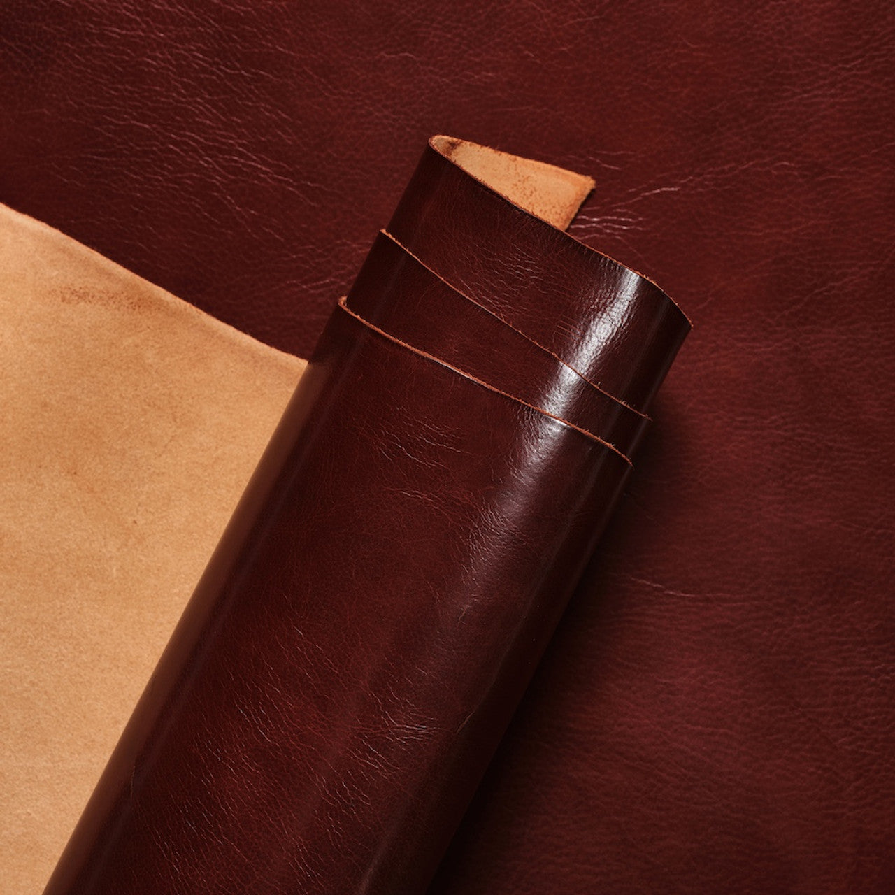 Close-up view of premium Cognac Invecchiato leather from La Bretagna, highlighting the rich, natural grain, depth of color, and the smooth, luxurious finish of this high-quality hide.