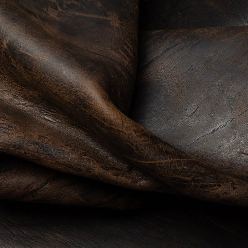 Close-up view of a Zulu Wild African Kudu leather hide, highlighting the distinct, rugged natural grain, rich earth tones, and the unique, character-filled texture of this premium exotic leather.
