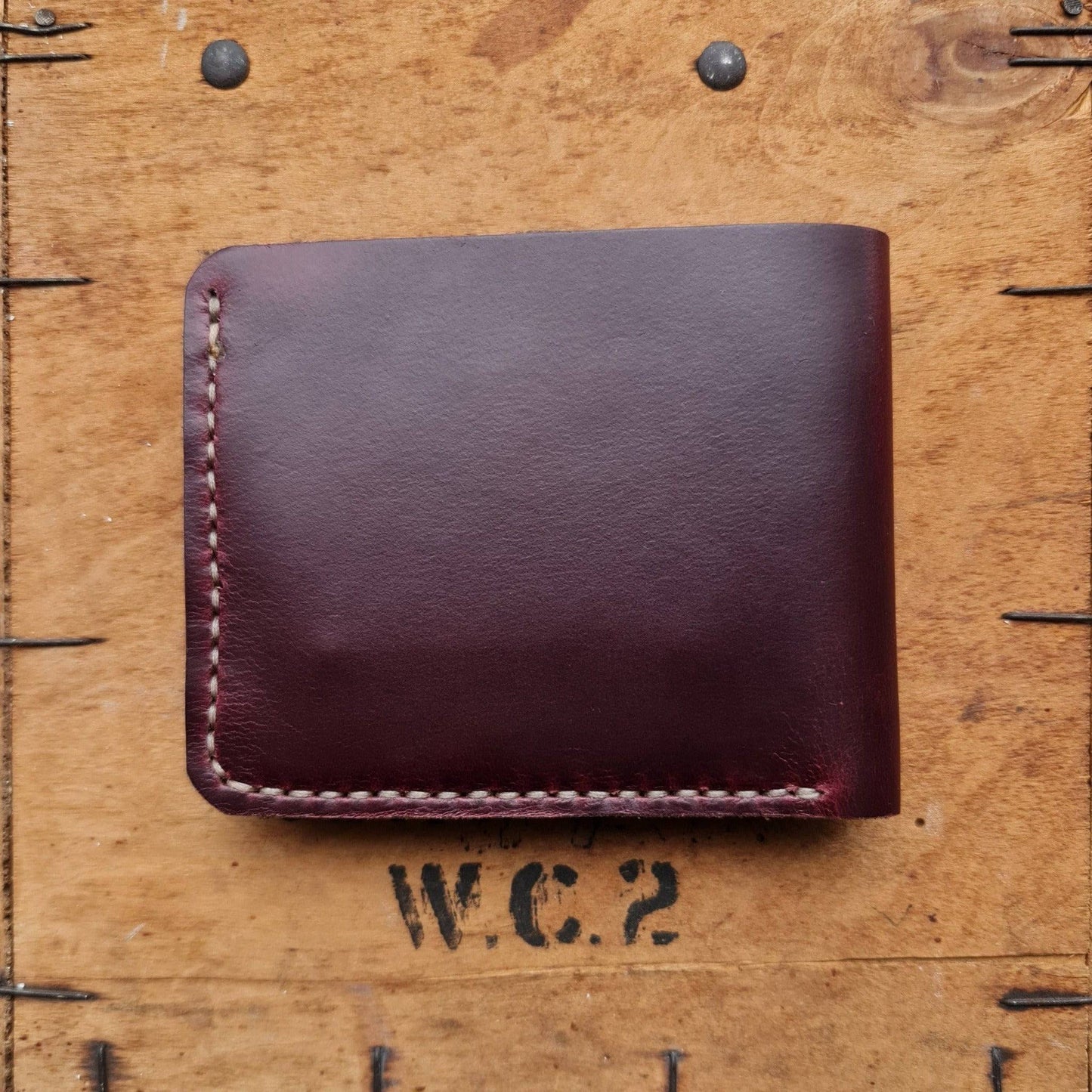 The Frontiersman men's leather wallet with cash and card holder in Burgundy leather - back 